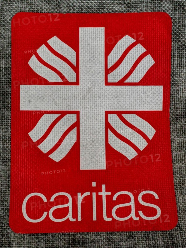 Patch with inscription Caritas