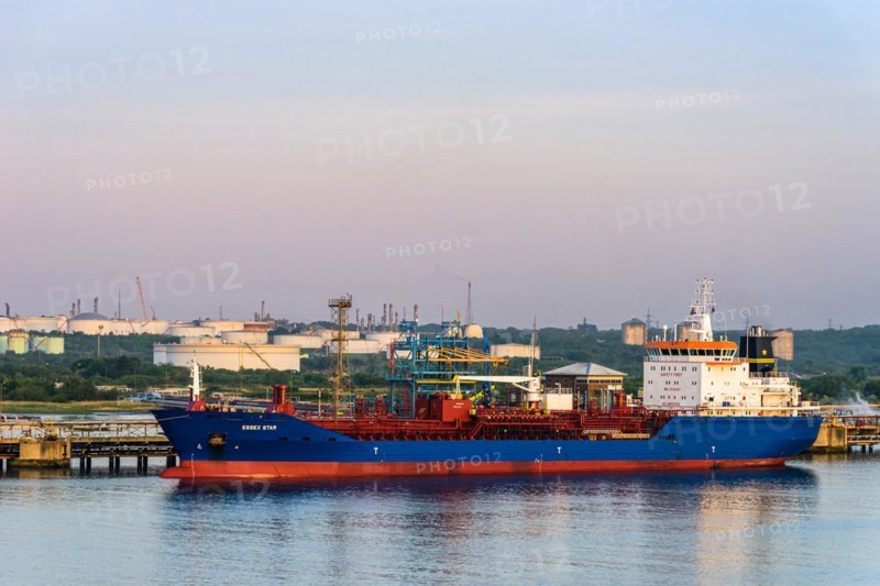 Sunrise over Gas tankers and Esso Oil Terminal