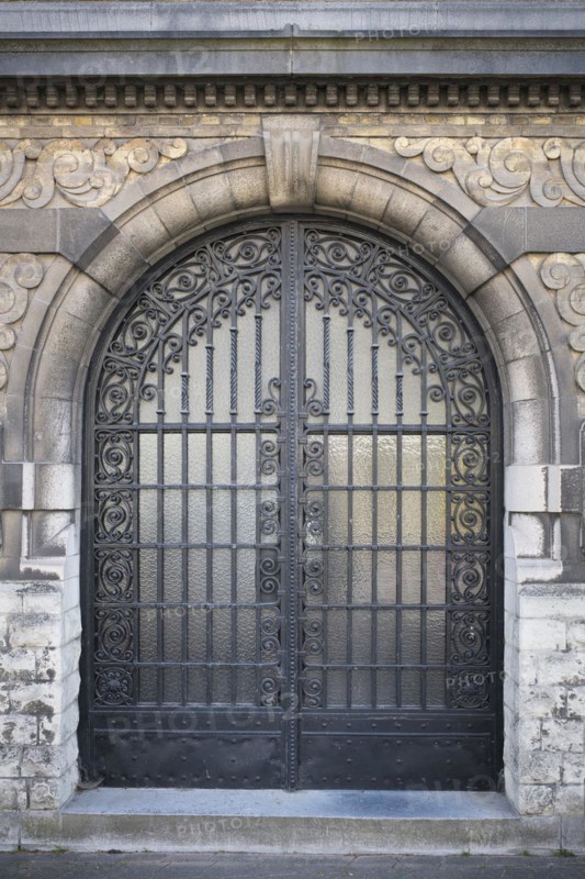 Old wrought iron door in the old town of Veurne