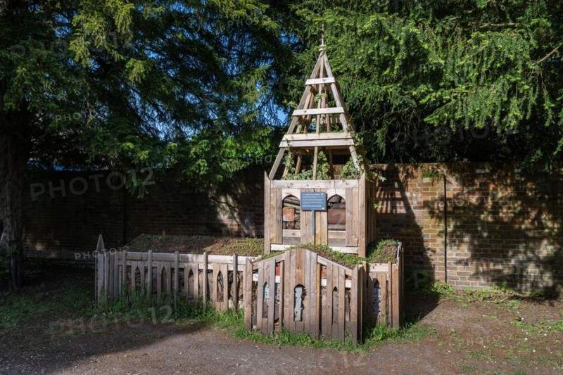 Wooden insect hotel built in the style of Salisbury Cathedral