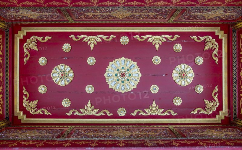 Red ceiling with golden floral ornaments in the Siamese Temple Sala-Thai I