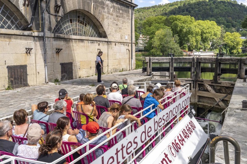 Excursion boat in a lock on the river Doubs