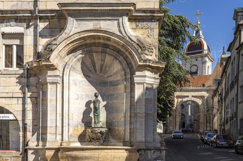 Fountain in the old town and St John's Cathedral in Besancon