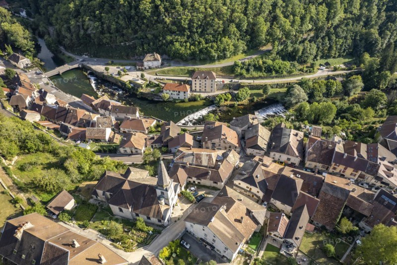 The village of Lods and the river Loue seen from the air