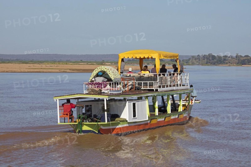 Tourists on a motorboat trip on the Tsiribihina