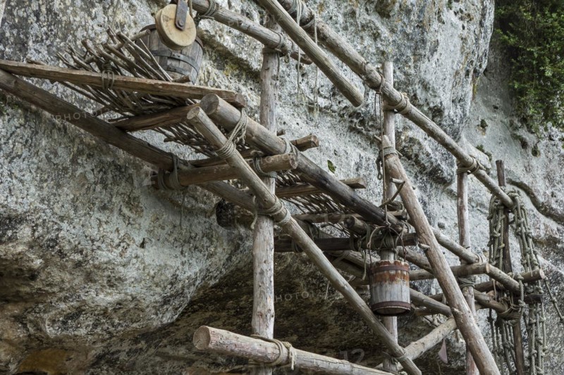Medieval wooden scaffolding at the fortified troglodyte town La Roque Saint-Christophe