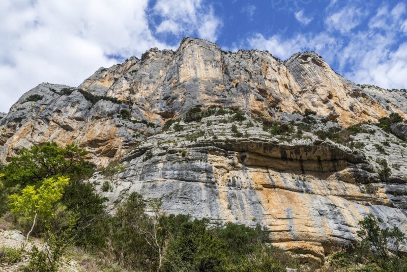 Vertical limestone cliff seen from the Sentier Martel in the Gorges du Verdon
