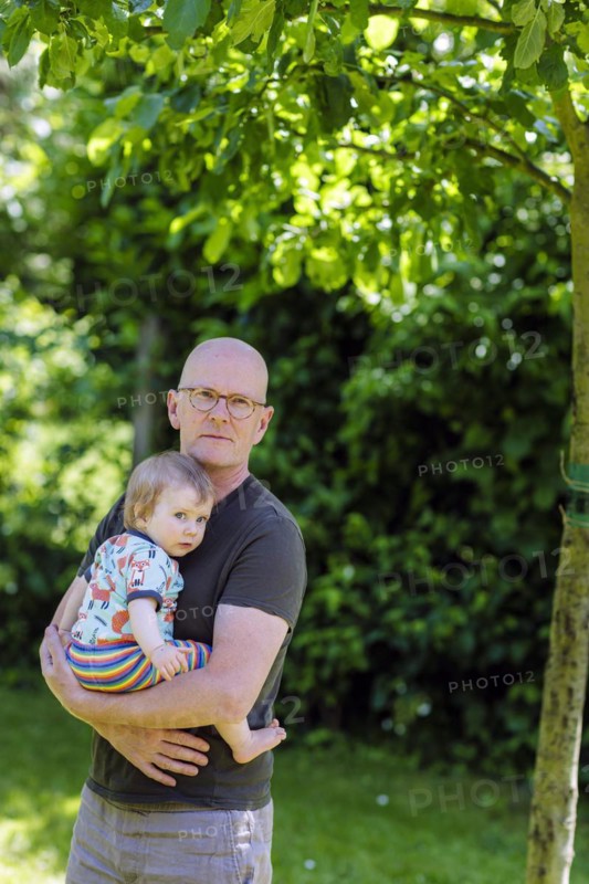 Old father with toddler
