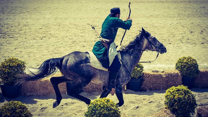 Ottoman archer riding and shooting on horseback