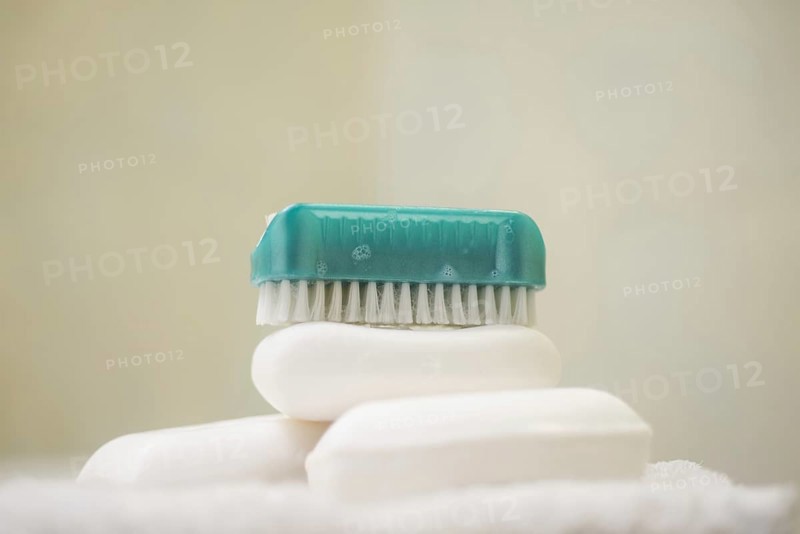 Soap and Brush Nail Cleaner in Bathroom