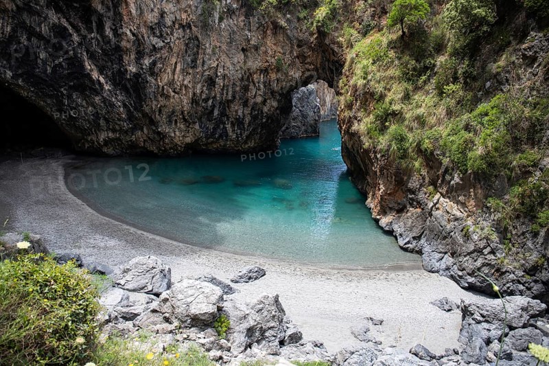 Beautiful hidden beach. The Saraceno Grotto is located directly on the sea in Salerno