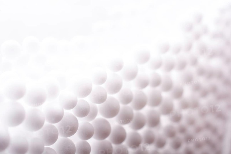 White little polystyrene foam balls as background