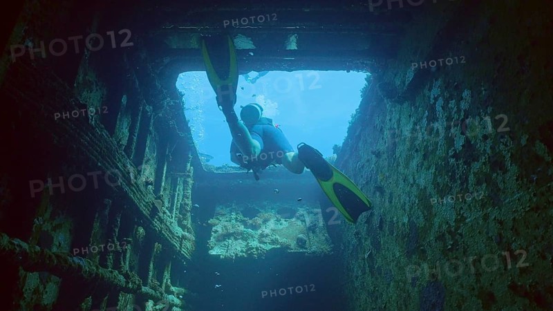 Scuba diver swims to exit inside cramped hold of ferry Salem Express shipwreck