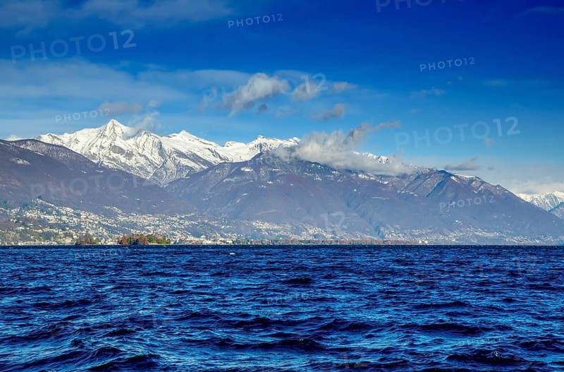 Alpine Lake Maggiore with Brissago Islands and Snow-capped Mountain in Ticino