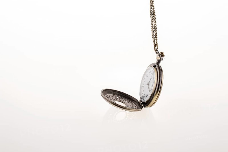 Isolated retro styled pocket watch on white background