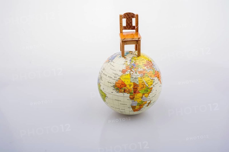 Chair is placed on the top of the model globe