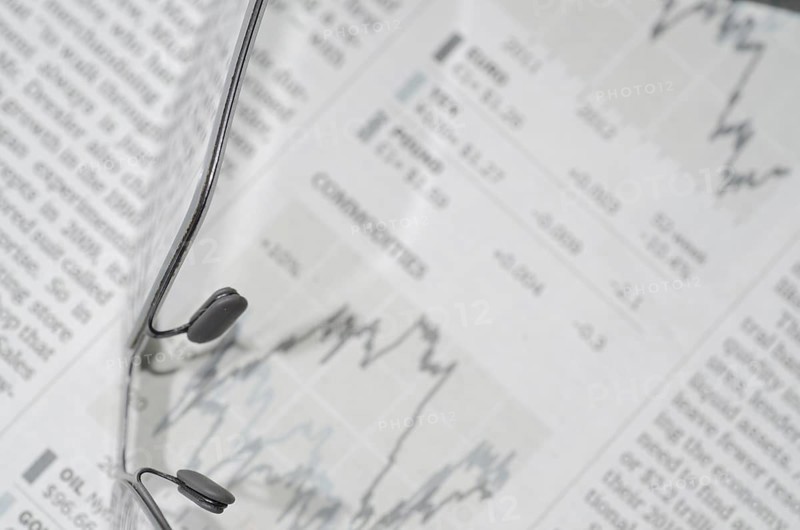 Financial Newspaper and Eyeglasses