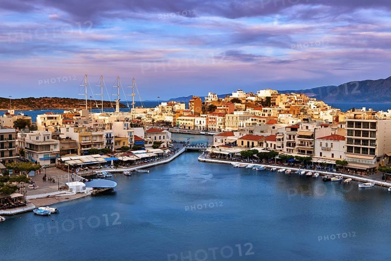 Colorful view of Voulismeni lake and Agios Nikolaos town on Crete island