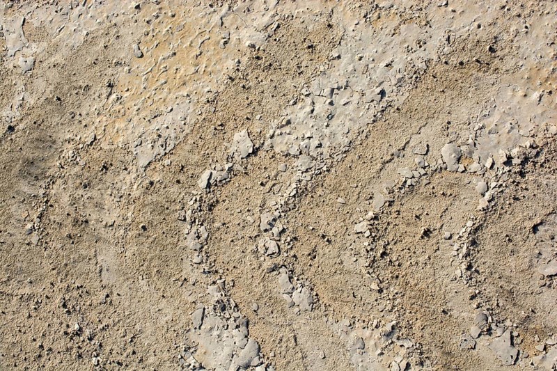 Tire tracks tire marks on Concrete as abstract grunge texture