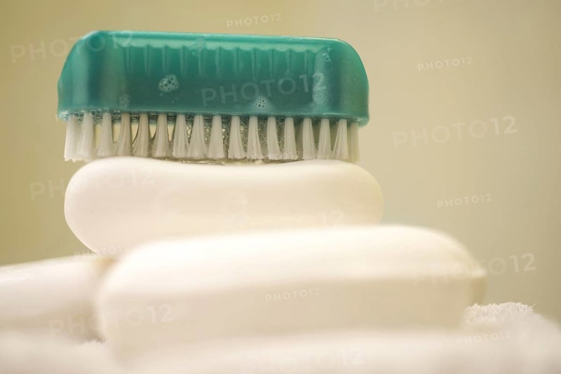 Soap and Brush Nail Cleaner in Bathroom