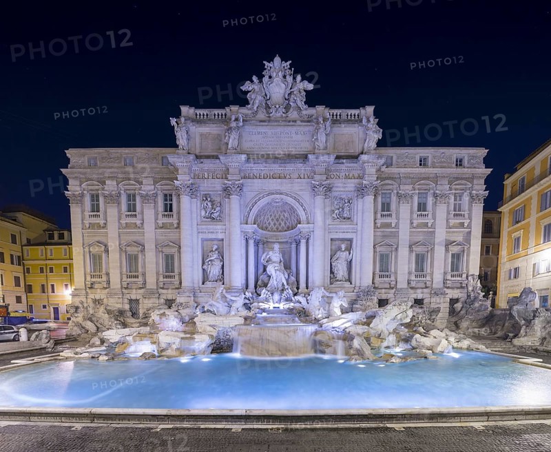 Trevi Fountain at Night in City Square in Rome