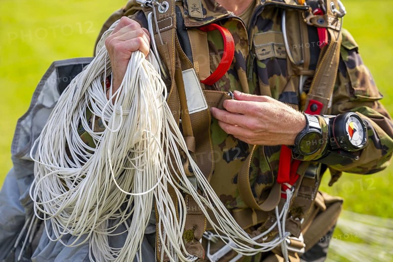 Military Parachuter Holding His Parachute in Switzerland