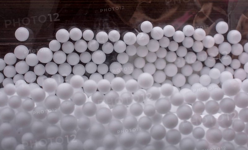 White little polystyrene foam balls as background