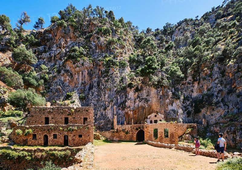Ruins of remote abandoned Orthodox Katholiko monastery and bridge over Avlaki gorge near Gouverneto moni