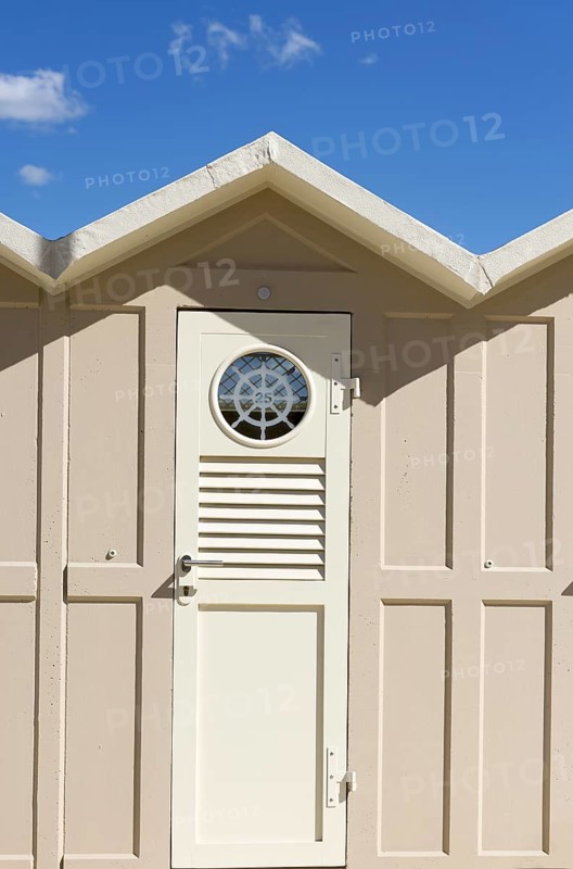 Beach Hut with Blue Sky and Couds in Italy