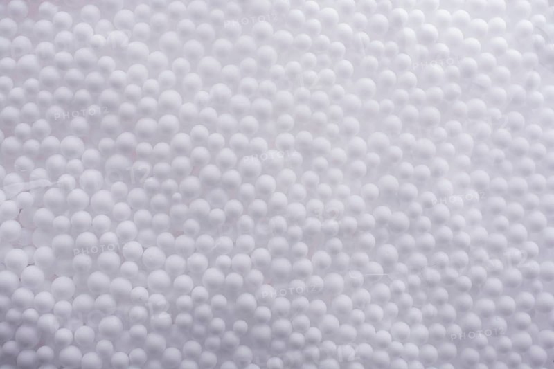 White little polystyrene foam balls as background