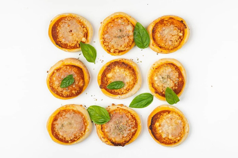 Nine small pizzas Margherita