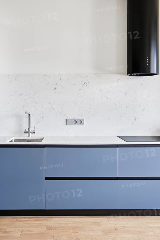 A modern kitchen with gleaming household equipment