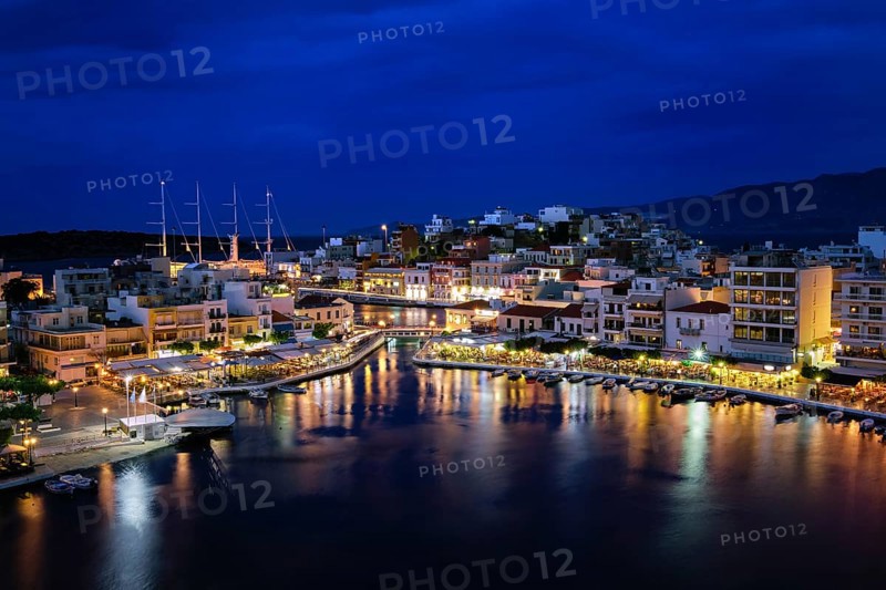 Colorful view of Voulismeni lake and Agios Nikolaos town on Crete island