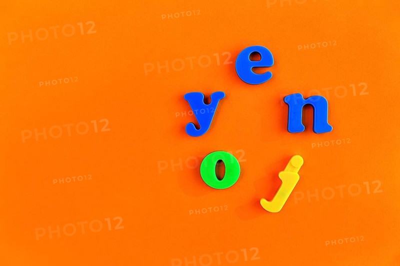 Colourful letters form the word enjoy