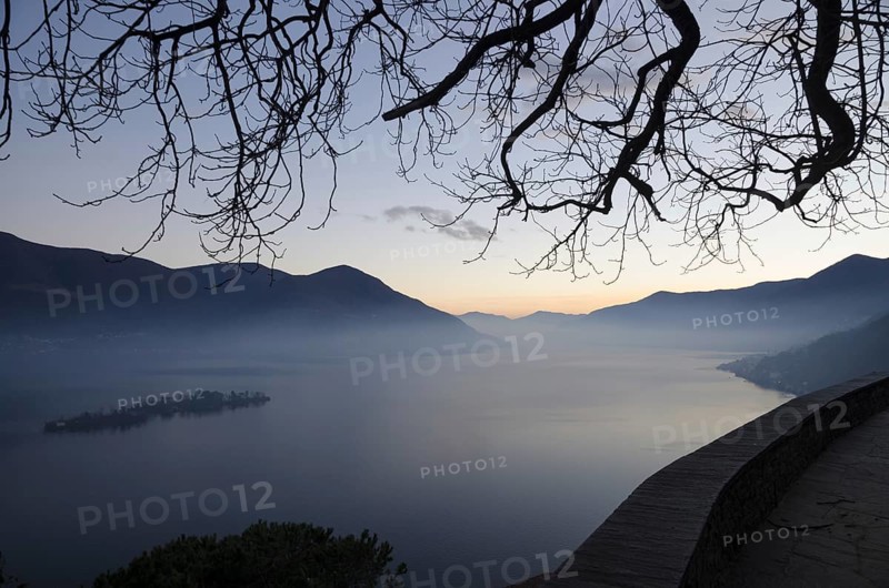 Alpine Lake Maggiore in Dusk with Brissago Islands and Mountain in Ticino