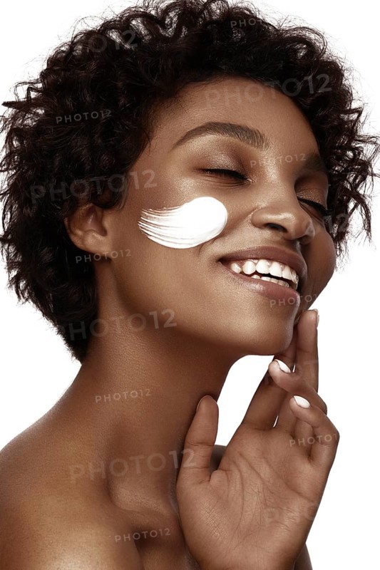 African American skincare models with perfect skin and curly hair. Beauty spa treatment concept