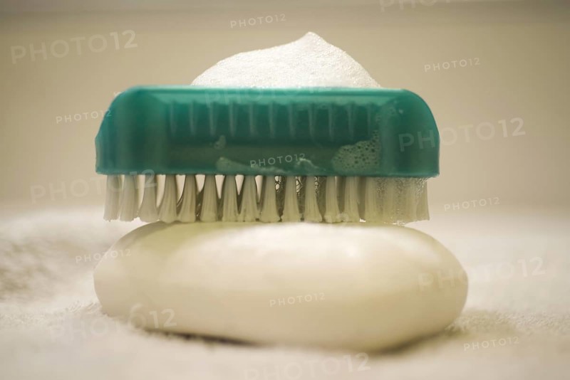 Soap and Brush Nail Cleaner in Bathroom