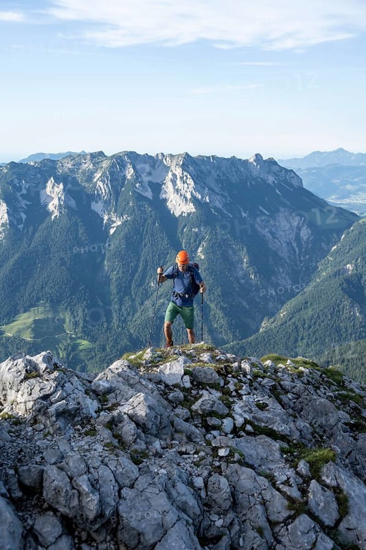 Mountaineer on a ridge path