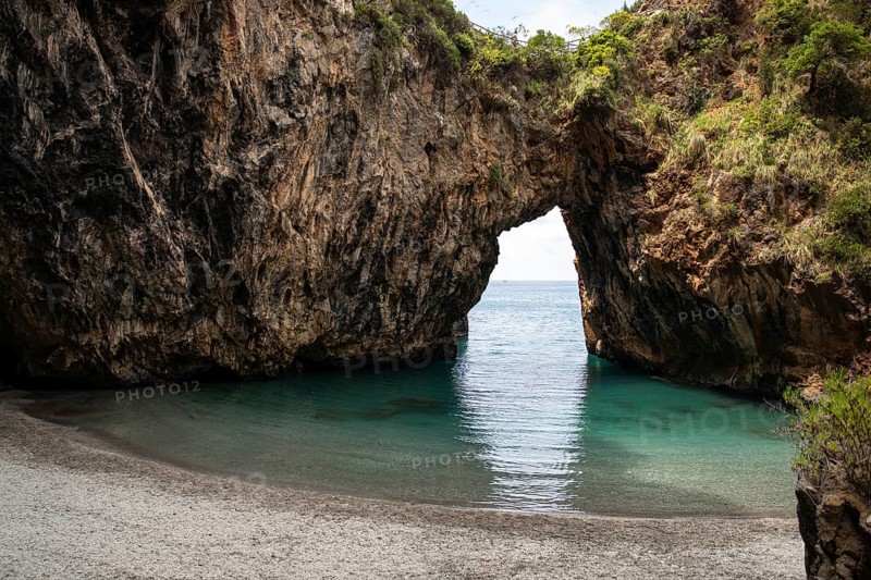 Beautiful hidden beach. The Saraceno Grotto is located directly on the sea in Salerno