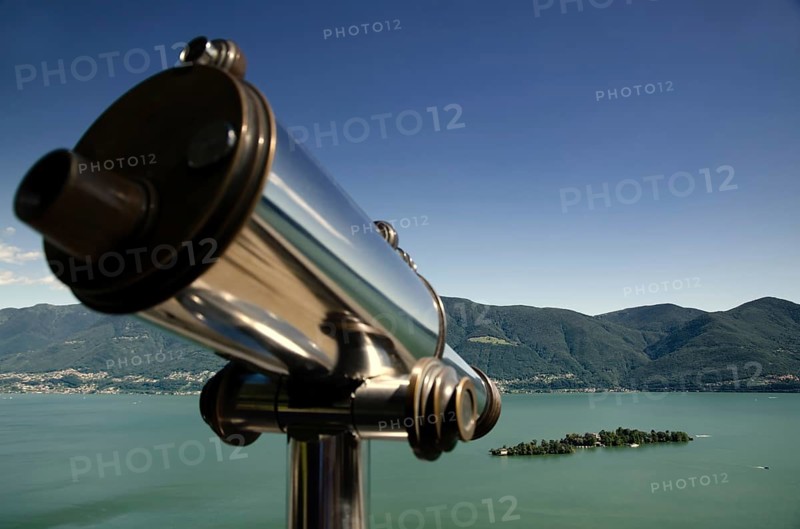 Telescope and Mountain over Alpine Lake Maggiore with Clear Sky in Brissago Islands in Ticino