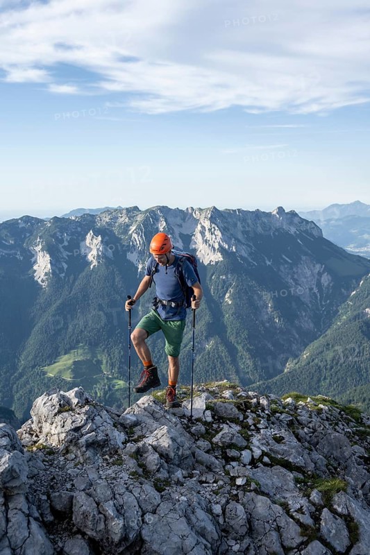 Mountaineer on a ridge path