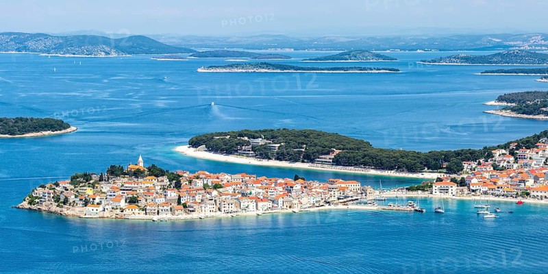 Primosten town on a peninsula in the Mediterranean Sea Holiday Panorama in Primosten