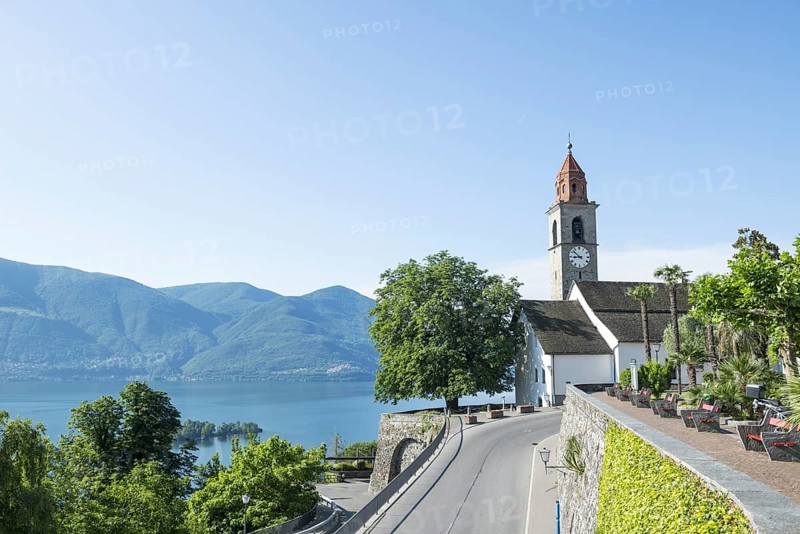 Church with Panoramic View and Mountain road Above Lake Maggiore in a Sunny Day in Ronco sopra Ascona