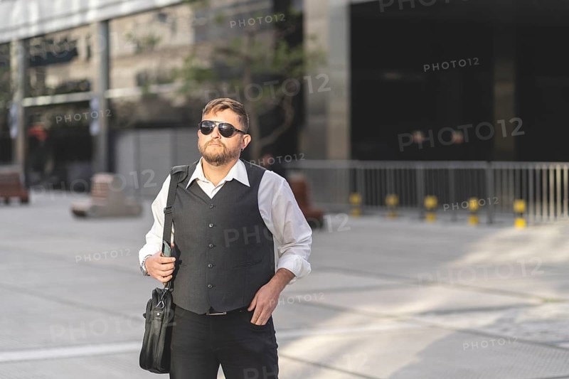 Business man posing on the street