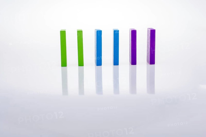 Colorful Domino Blocks placed on a white background