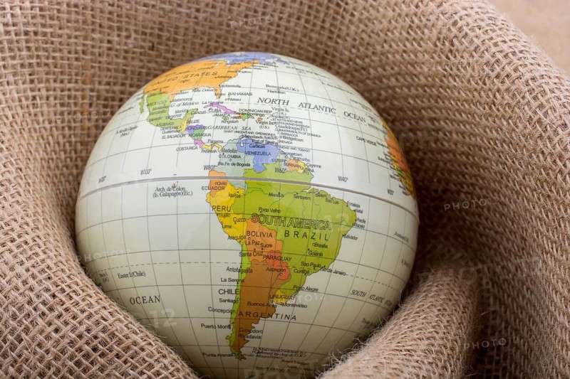 Linen canvas is wrapped around a model globe