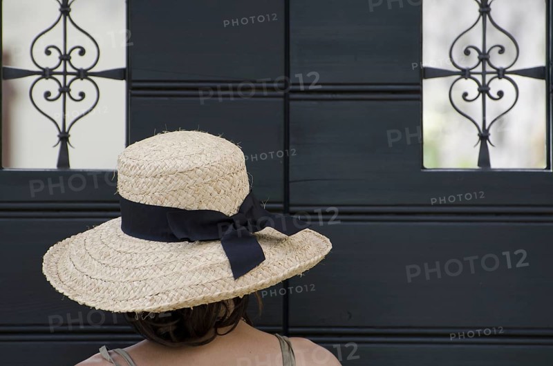 Woman with a straw hat