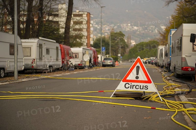 Circus Sign and Many Caravan on the Street in Locarno