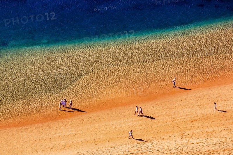 Strollers on the sandy beach Playa de Las Teresitas