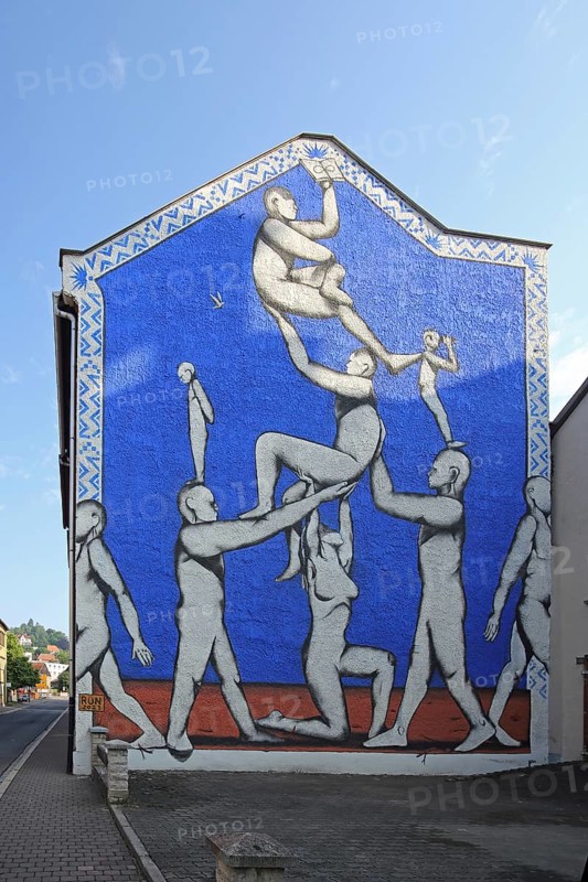 Mural With open eyes and arms by Giacomo Bufarini aka RUN 2021